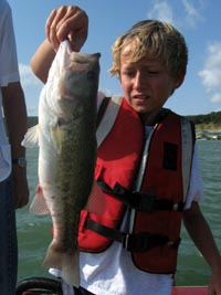 Clark catching bass on Lake Travis
