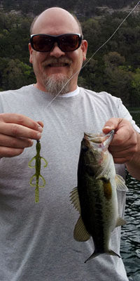 Alan catching bed fish on Lake Austin