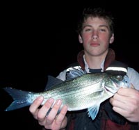 Drew with a white bass