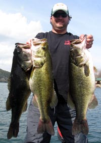 Kyle with triplet 9 lb Lake Austin bass. Sweet!