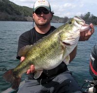Kyle with triplet 9 lb Lake Austin bass. Sweet!